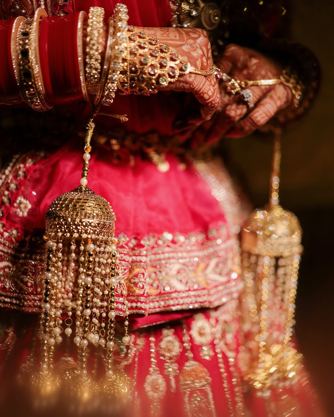 Bride in traditional attire, close-up wedding portrait by Anjali Films