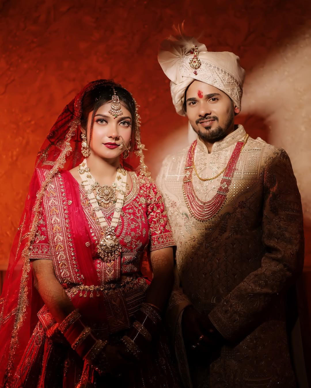 Wedding day couple portrait captured by Anjali Films