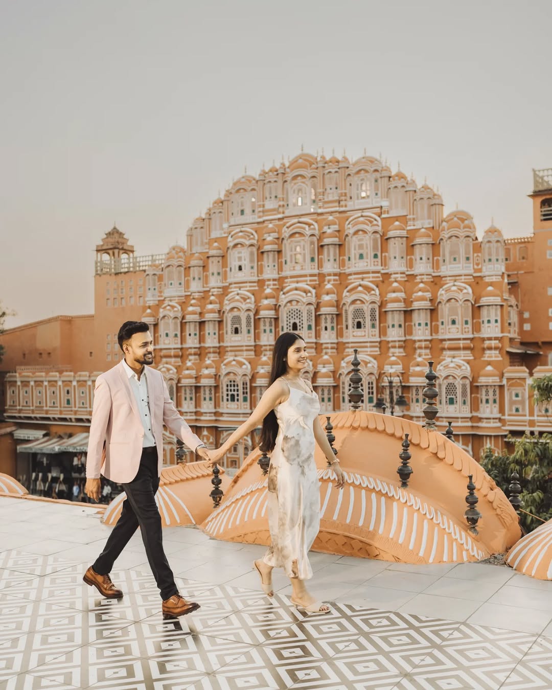 Edited pre-wedding still at Hawa Mahal, Jaipur, delivered by Anjali Films